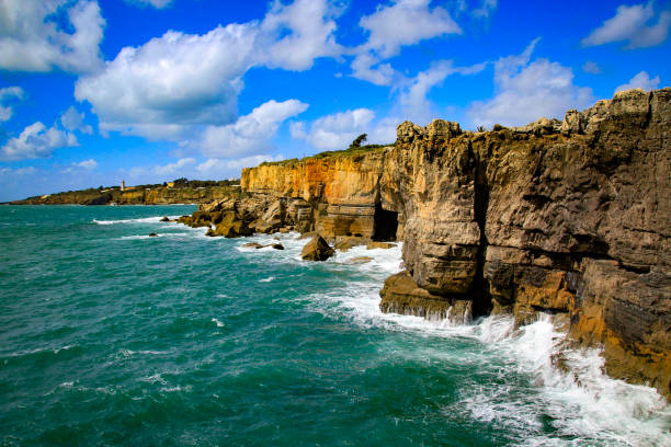 Cascais, Lisbon, Portugal. Boca de Inferno cliff landscape on the Atlantic coast on the Costa de Guia.  The place became world-famous through the suicide of the poet Guilherme de Faria and the British poet Aleister Crowley also faked his suicide here.