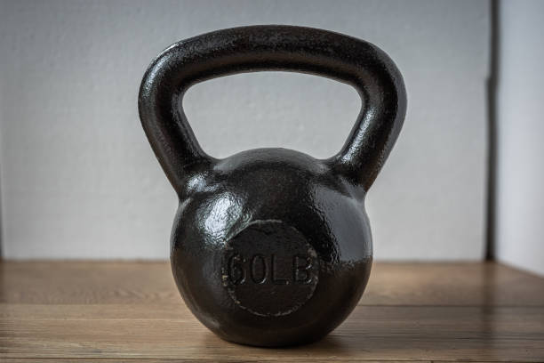 istock Kettlebell strength resistance training weightlifting exercise equipment dumbbell free weight 2166168413
