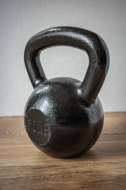 istock Kettlebell strength resistance training weightlifting exercise equipment dumbbell free weight 2166168423