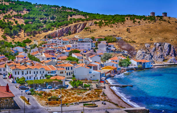 Bozcaada, Turkey, View of the port, fortress, Aegean Sea, promenade, shops and restaurants.