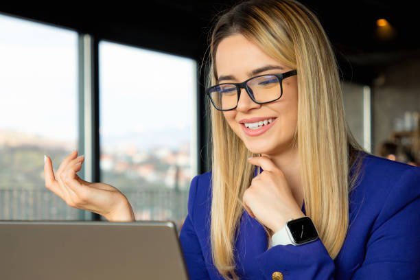 istock Smiling Businesswoman Explaining Project on Video Call 2166171295