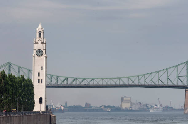 istock clock tower and Jacques Cartier Bridge Montreal Canada 2166179717