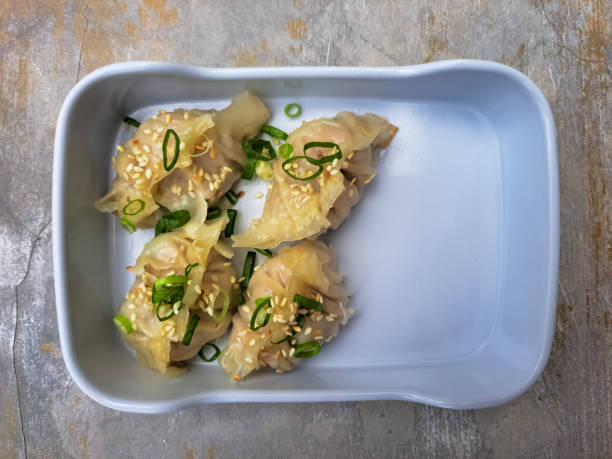 Dakgogi Mandu Or Chicken Dumplings With Chicken and Vegetable Filling. Korean Food Menu. Top View.