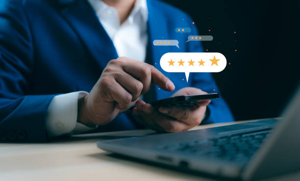 istock User give rating to service experience on online application, Customer can evaluate quality of service leading to reputation ranking of business. Customer review satisfaction feedback survey concept. 2166184554