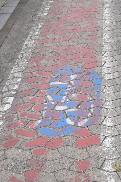 istock faded bike road paint 2166189180