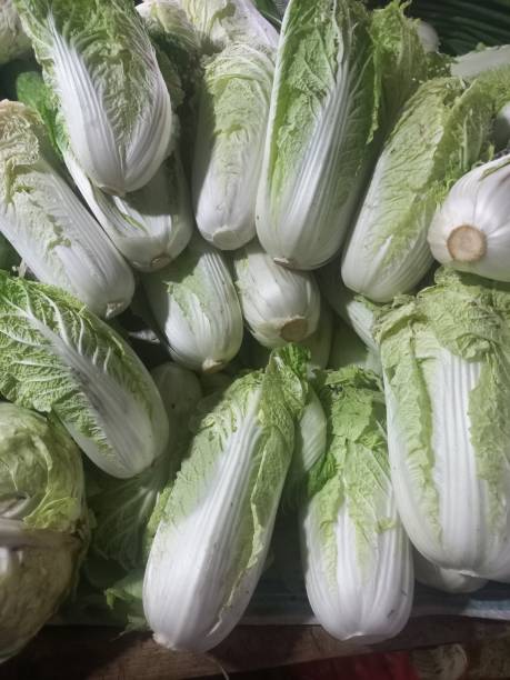 istock mustard greens on stall at the market 2166190617
