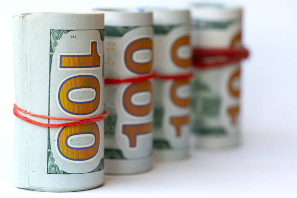 American dollars. A stack of hundred dollar bills.