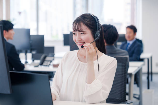 istock Young businesswoman speaking wearing a headset. 2166206692