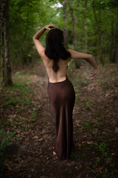 istock Serene Woman with Round Mirror Portrait in Forest 2166207531
