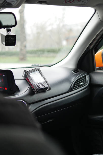 istock POS machine on yellow taxi 2166209175