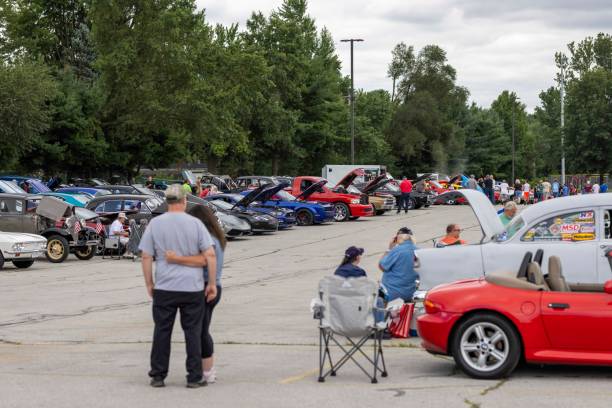 Springfield, Ohio  USA August 9 2024: Engines and engine parts of historic cars. Car show, display of old historic cars and the latest luxury cars.