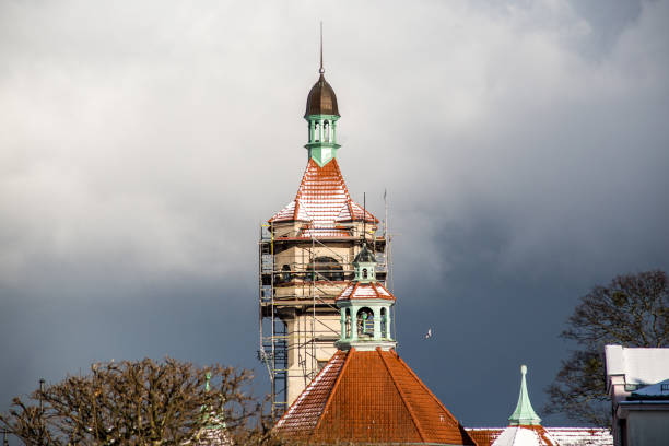 Lighthouse in Sopot on a winter afternoon. Lantern against the background of storm clouds