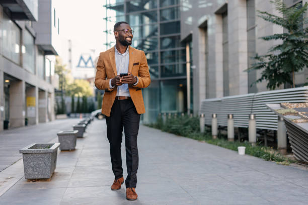 istock Businessman using smartphone in urban environment 2166213788