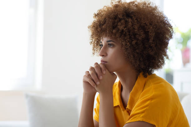 istock Depressed woman at home 2166215203