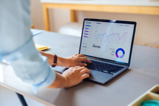 istock Business Professional Analyzing Financial Data on Laptop 2166223651
