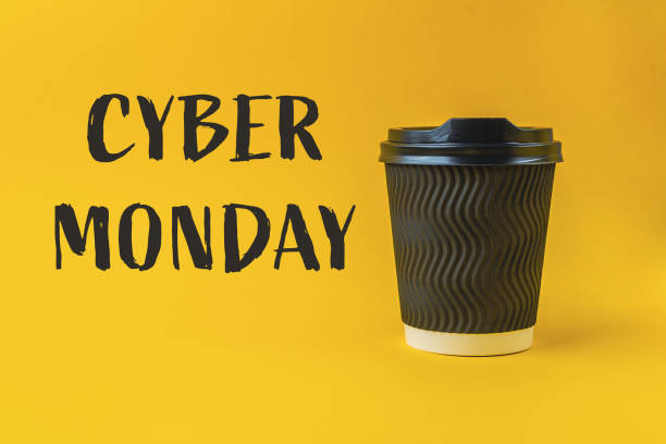 istock A coffee cup with a black lid sits on a yellow background 2166227084