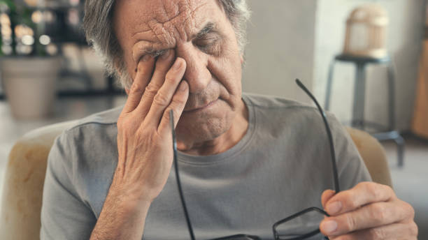 istock Old man with eye fatigue 2166229810