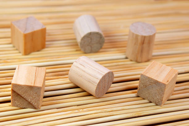 istock Wooden geometric figures, cubes and cylinders 2166238657