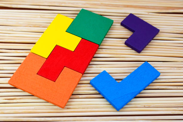 Puzzle with colorful wooden figures