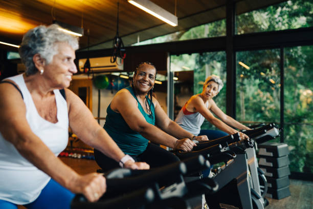 istock Group of mature women practicing together in a luxury spa 2166244533