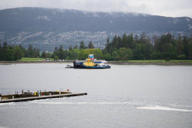 Vancover, British Columbia, Canada - May 18, 2024: Floating Exxon fuel station in harbor of Vancouver, British Columbia.