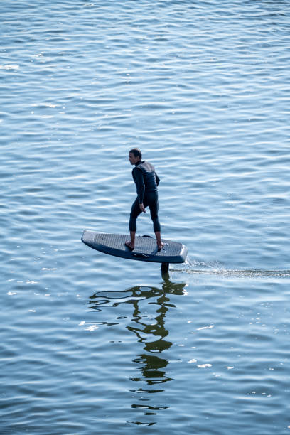 istock A man on a hydrofoil surfboard 2166249359
