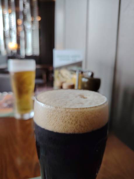 istock Cold glass of dark stout beer 2166259255