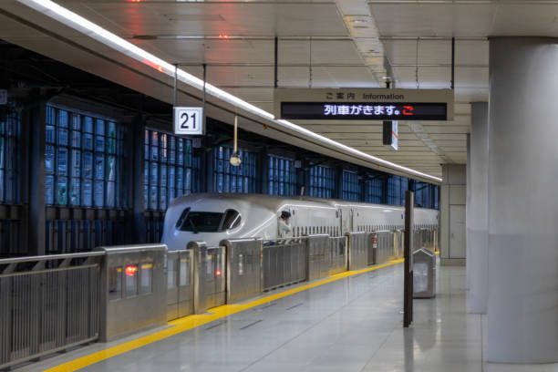 Shinagawa, Japan- 10 May 2024: Bullet train approaching to Shinagawa Station, Japan. Shinagawa Station is one of the principal transportation hubs of Tokyo.