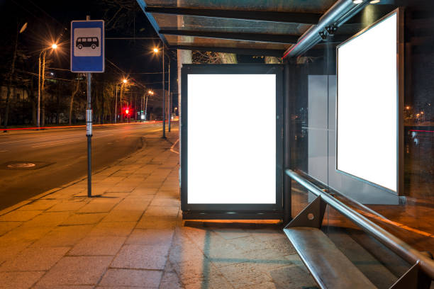 istock Vertical Mockup Of An Empty Bus Stop Advertising Light Box At Night 2166262358