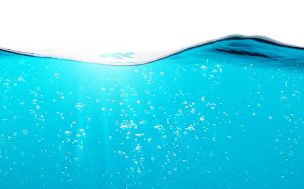 istock Water Wave. Air Bubbles Float Up Under Water with Light Rays of Sunlight. Oxygen Relaxation. Blue Water Textured on White Background. 2166264560