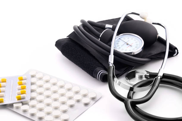 istock mechanical tonometer, sphygmomanometer and stethoscope and tablets in a blister 2166267147