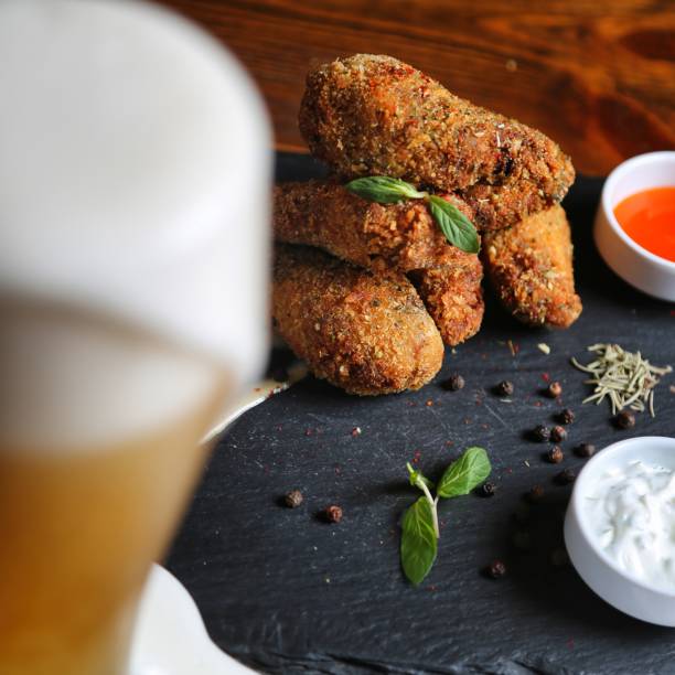 istock Crispy Fried Chicken Wings With Dipping Sauces 2166276204