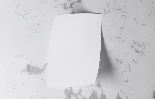istock Empty vertical A5, A4, A3 size poster mockup on marble background 2166278732
