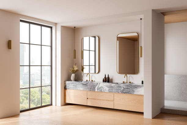 istock Light home bathroom interior with sink and accessories, panoramic window 2166279624