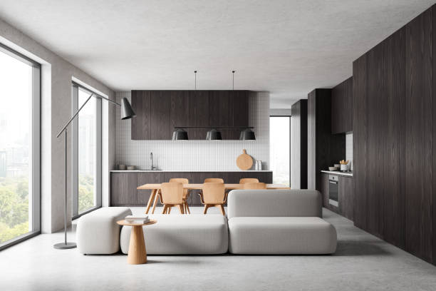 istock Stylish home interior with relaxing and dining zone, panoramic window 2166280110