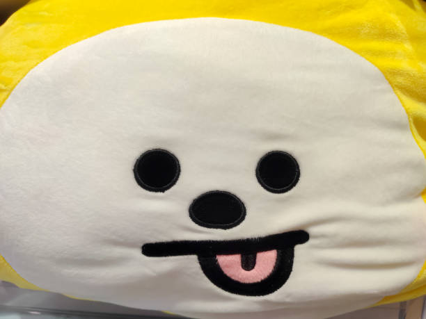 istock Funny smiling expression with tongue out on doll face 2166289958
