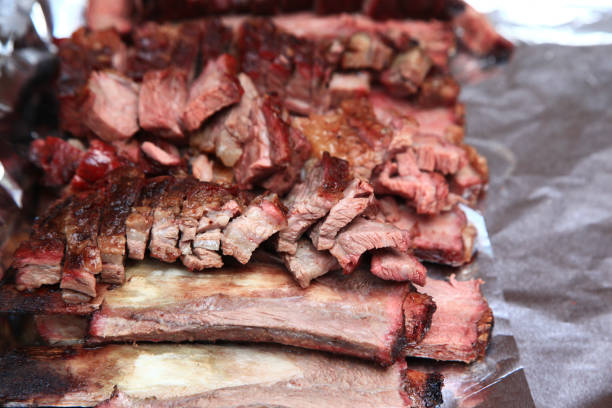 Smoked ribs are served on white bread, March 15, 2014, in Northport, Alabama.
