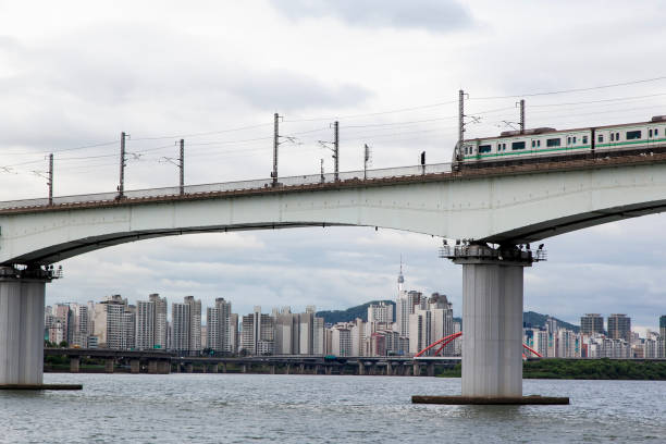 istock Railway bridge on Han River in Seoul, South Korea 2166299712