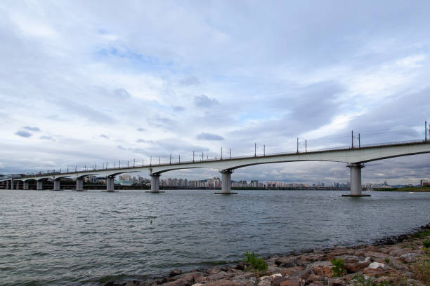 istock Railway bridge on Han River in Seoul, South Korea 2166299716