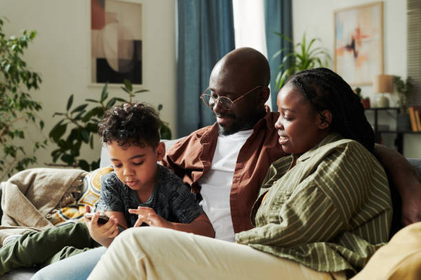 istock Happy family spending weekend at home 2166305065