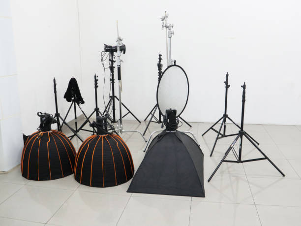 istock Photography studio equipment, lighting tools, softbox, beauty dish, reflectors, umbrellas,led panels and white walls 2166306761