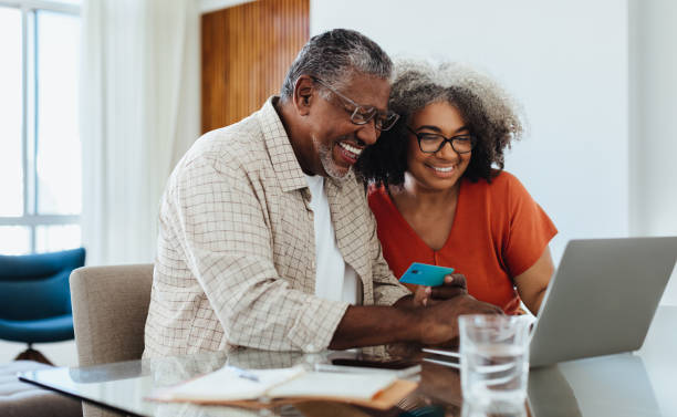 istock Fintech for Seniors: Confident grandparents making online payment while shopping together 2166309311