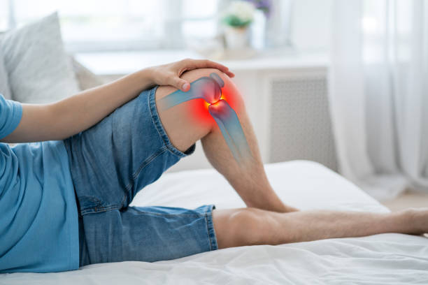 istock Knee pain, joint inflammation, arthritis and degenerative changes, man suffering from leg ache and doing self-massage 2166310032
