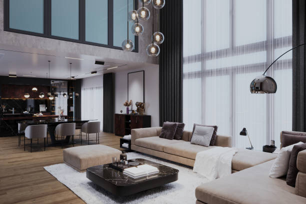 istock A sunset-themed living room with a high ceiling, cozy sofa, and fireplace, sunlit through large windows 2166310165