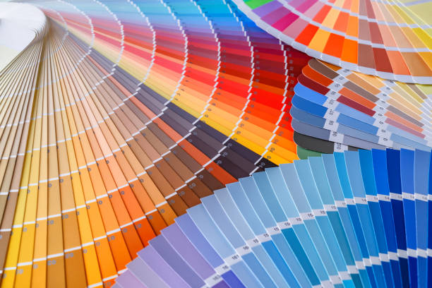 istock Color wheel for choosing paint tone.Painter and decorator work table, color swatches 2166311927