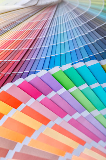 Color wheel for choosing paint tone.Painter and decorator work table, color swatches