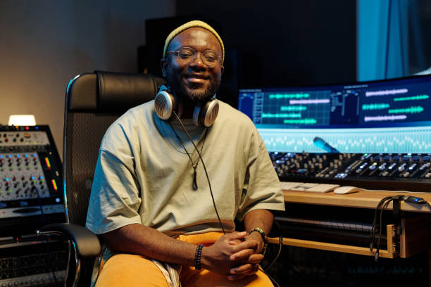 istock Portrait of Smiling Man in Modern Recording Studio 2166312083