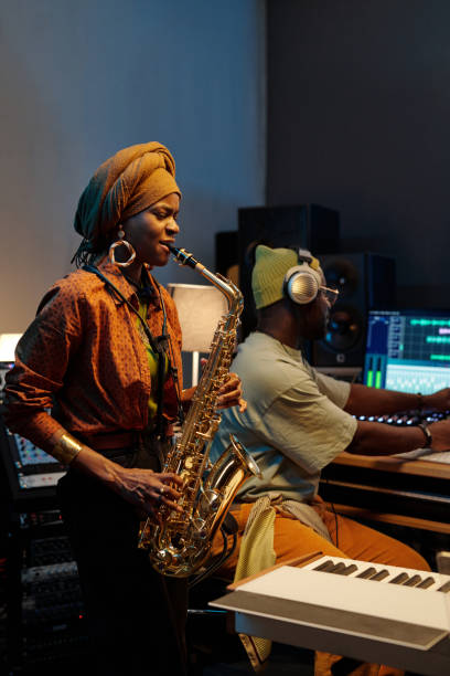 istock Performing Jazz Music in Recording Studio with Saxophone 2166312105