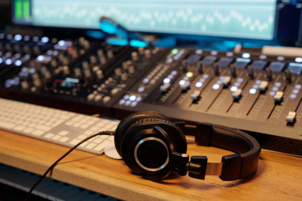 istock Mixing Music in Modern Recording Studio with Headphones 2166312111