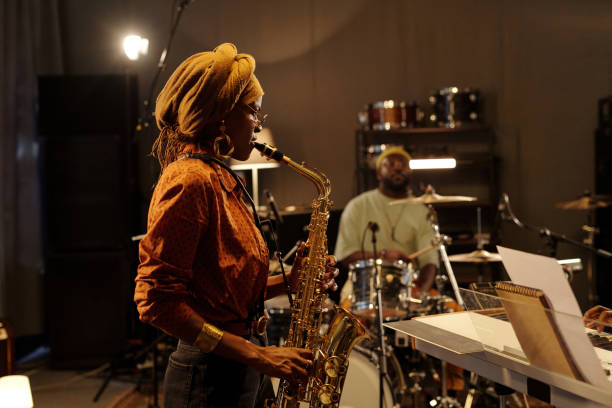 istock Playing Saxophone During Jazz Band Rehearsal Session 2166312116